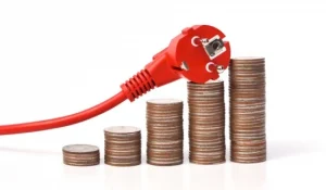 a red plug and stacks of coins