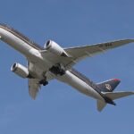 a plane flying in the sky